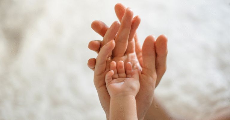 mom-dad-baby-hands-1200.png